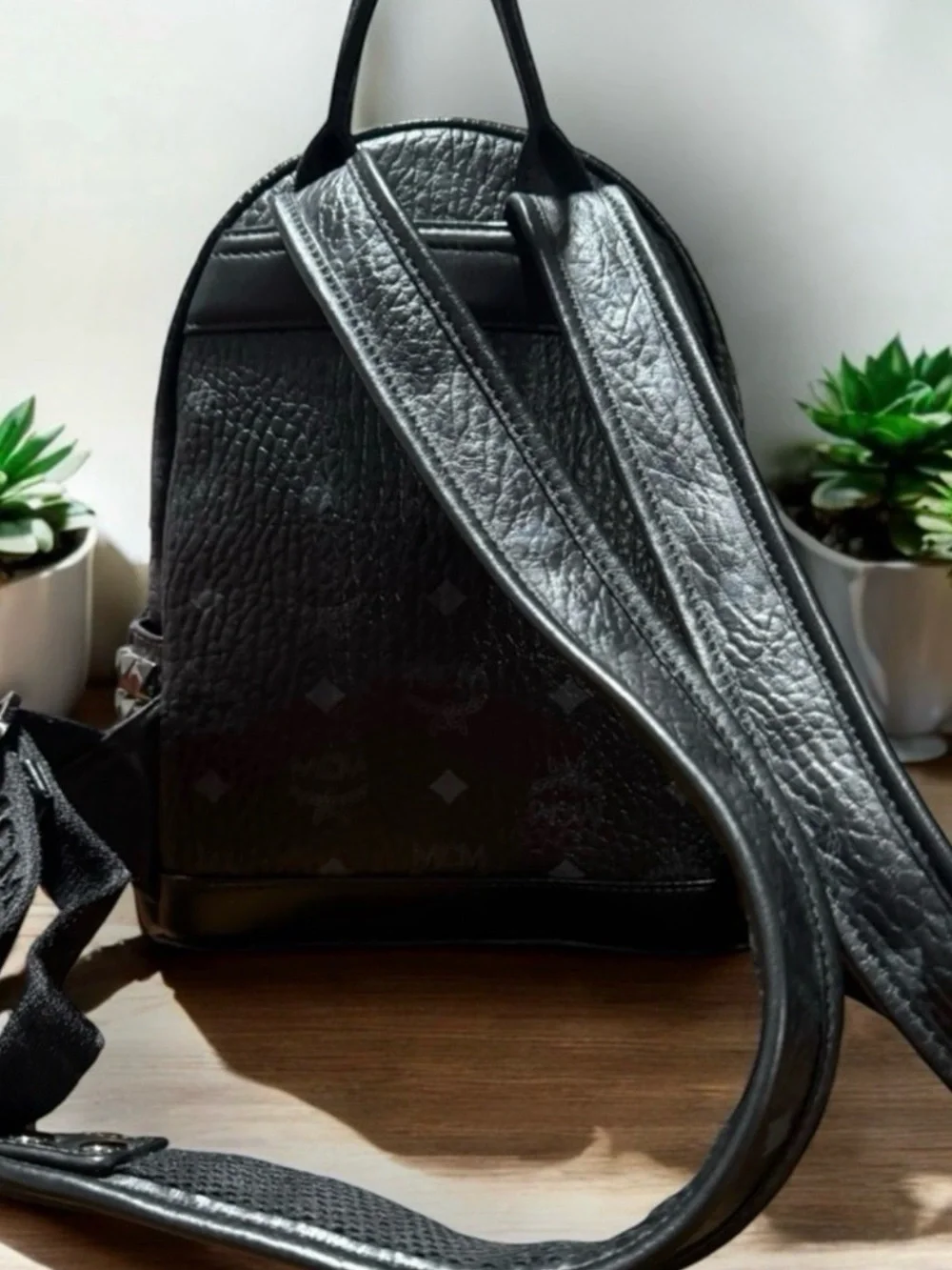 MCM Black Logo-Stamped Leather Mini Backpack with Stud Details